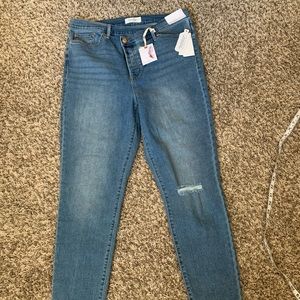 Jessica Simpson 31 skinny jeans asymmetric button